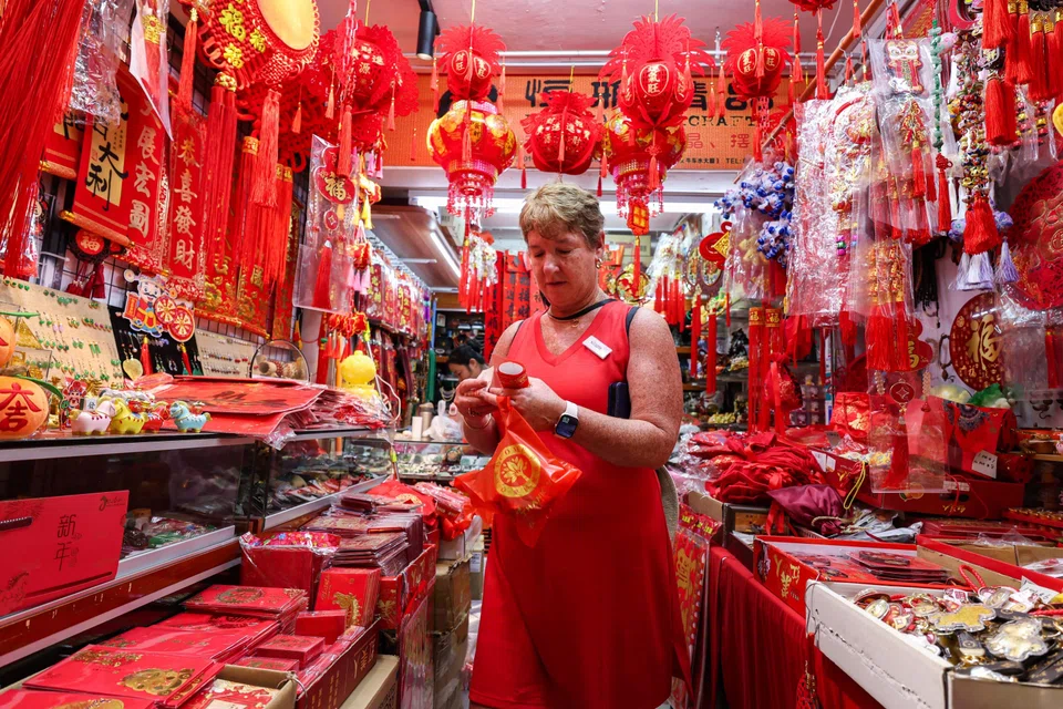 Mrs Nicole Rajkumar spent her first Chinese New Year with her “chosen family” – a group of women from the American Women’s Association. ST PHOTO: BRIAN TEO