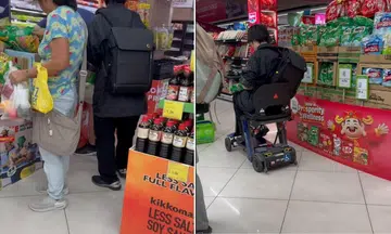 The man picks up a few packets of Milo before riding off in what appears to be a PMA. 