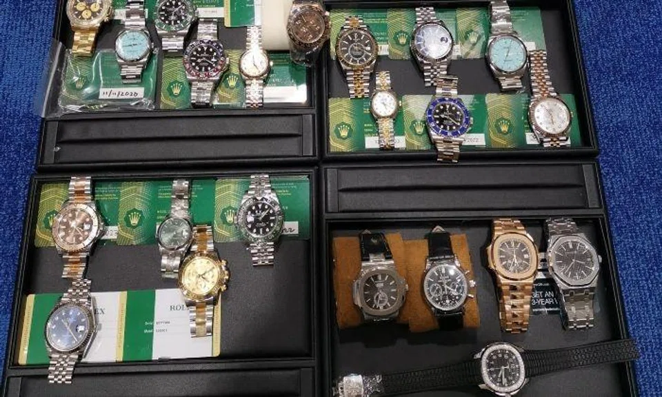 Police recovered 23 luxury watches amounting to $900,000.
