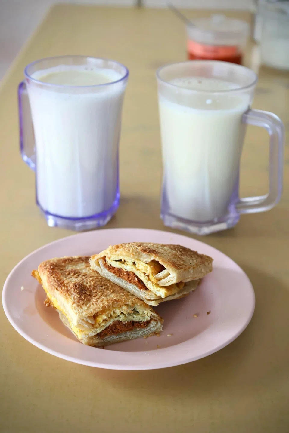 Sweet Soya Bean Drink and Toasted Bun With Meat Floss Egg at Yong He Eating House. ST PHOTO: HEDY KHOO
