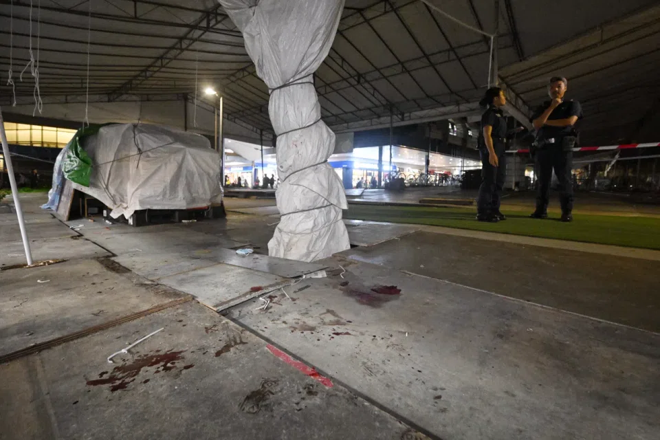 Blood stains on the ground near Tampines MRT station on Dec 19. ST PHOTO: AZMI ATHNI