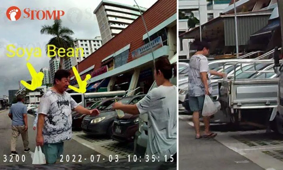 Porsche driver dumps plastic cup in back of lorry at Eunos carpark