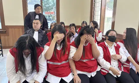 Alleged baby trafficking syndicate members at a hearing in Bandung, Indonesia, on June 30.