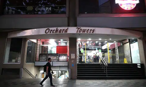 Man who was lying on floor in Orchard Towers threatened to rape female cop, called her a "whore"