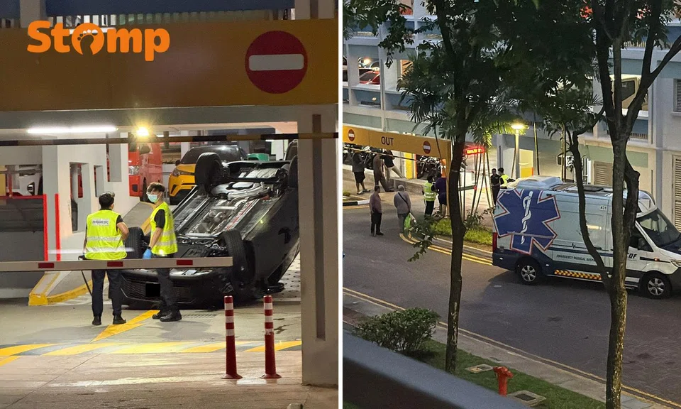 car overturned at woodlands carpark