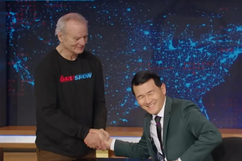Ronny Chieng (right) was congratulated by Bill Murray on The Daily Show on becoming a US citizen.