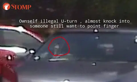 Motorist makes illegal U-turn in Bishan -- but points middle finger at other driver