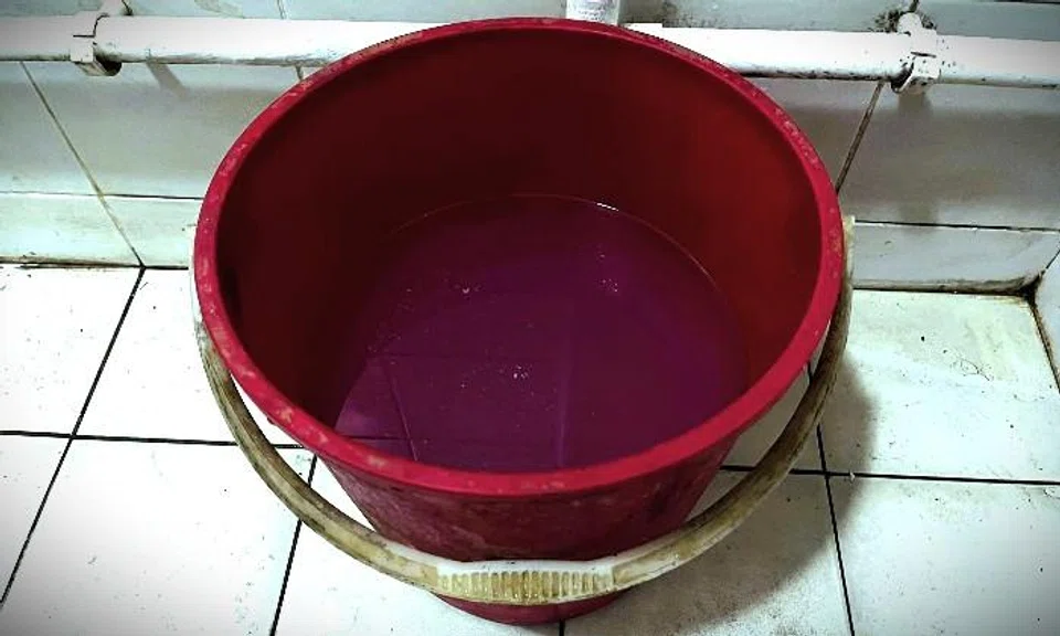 Man charged for pushing baby's head into pail of water
