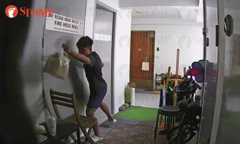 Grab and go: Delivery man helps himself to Geylang resident's dinner from McDonald's