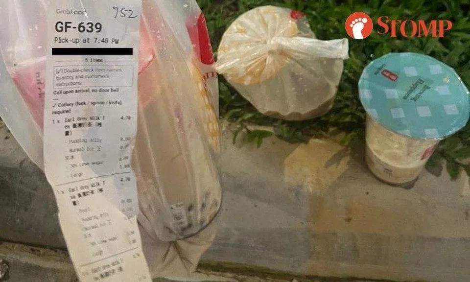 A GrabFood rider alleged that a customer threatened him after two of the five Gong Cha drinks he delivered were spilled.