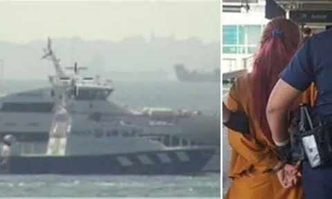 Police Coast Guard intercepted an Indonesia-bound ferry to arrest a woman passenger suspected of pouring hot water on a man four hours earlier in Macpherson.