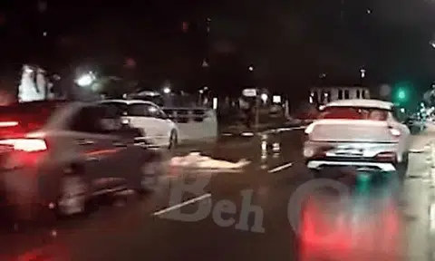 Cars forced to stop as drunk man lies down in middle of Serangoon Road at 2.25am
