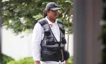 Man previously jailed over post on then President Halimah charged with using criminal force on cops