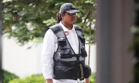 Man previously jailed over post on then President Halimah charged with using criminal force on cops