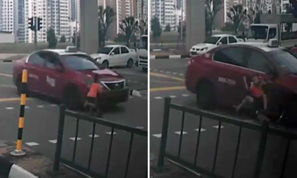 Kid whizzes by on skate-scooter to beat traffic light -- but learns painful lesson