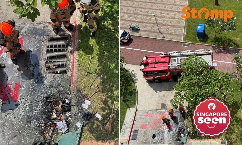 The fire involved the discarded items in a bin on the ground floor, said the SCDF.