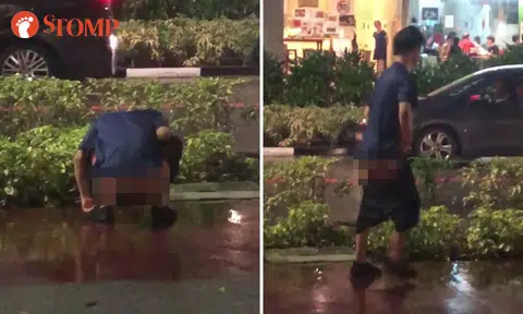 Man brazenly takes a dump in public next to Bras Basah MRT Station