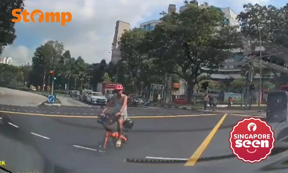 Cyclist close to car