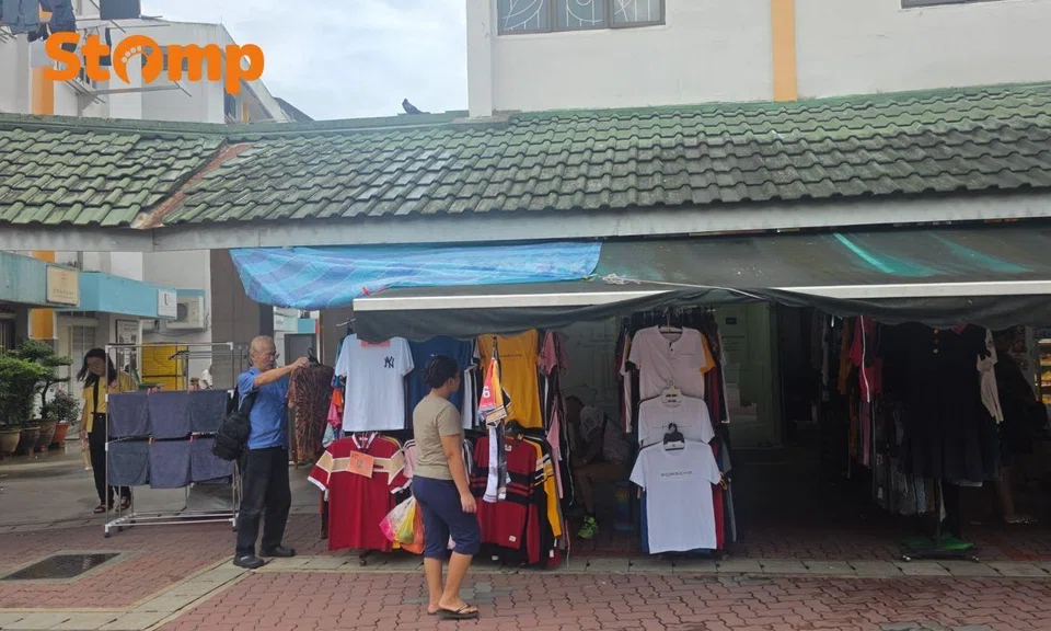 Shophouses and stalls in a public housing block.