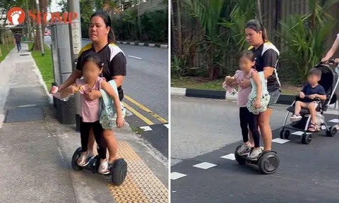 Is this safe? Woman rides hoverboard with young girl at Newton pedestrian crossing