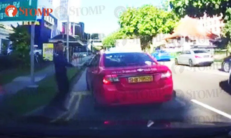 Driver honks at cabby for abrupt lane change -- only to get gestured at by passenger