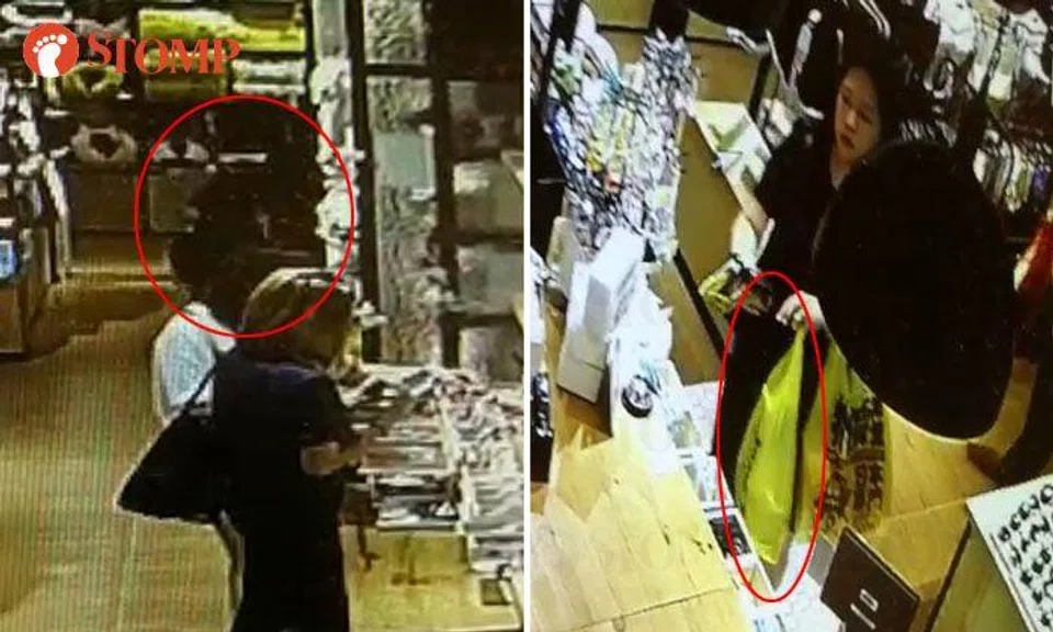 Woman takes another customer's shopping bag at City Square Mall store