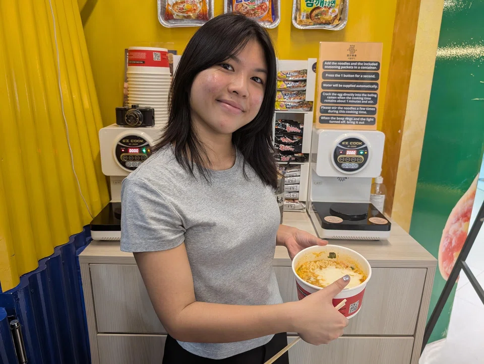 A creation of Original Shin Ramyun with egg, cheese and luncheon meat at Seoul Bunsik cost $7.90.