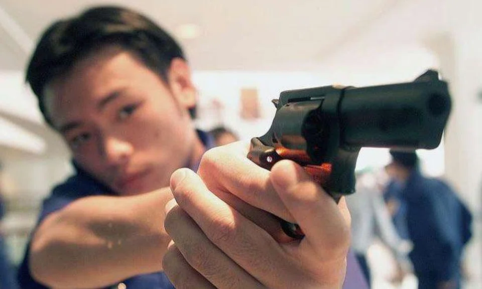 The Taurus M85 revolver officers use can hold five rounds of ammunition, but semi-automatic pistols can hold up to 17.PHOTO: LIANHE ZAOBAO FILE
