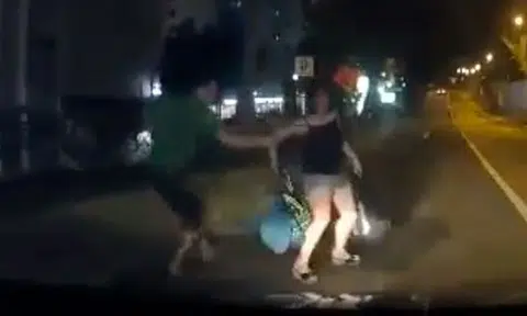 Woman suddenly dashes in front of moving car along Lorong Lew Lian