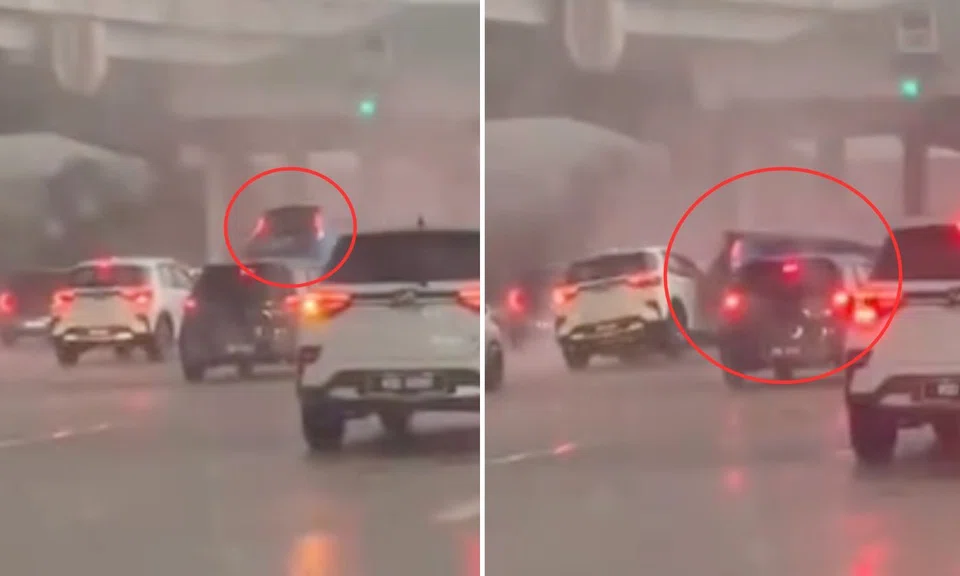 winds lifts car off the road and slams it against another vehicle