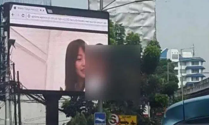 Passers-by shocked by outdoor TV screen showing Japanese porn in