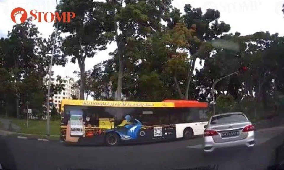 SBS Transit to take disciplinary action against bus driver who beat red light and almost collided with car