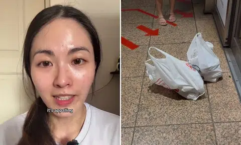 man uses plastic bags to chope place in mrt queue