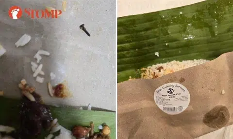 A Stomper shared photos of the loose screw on the wrapping paper with a Asian Catering Services sticker.