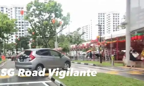 Woman dumbfounded after Honda makes U-turn at zebra crossing in Hougang