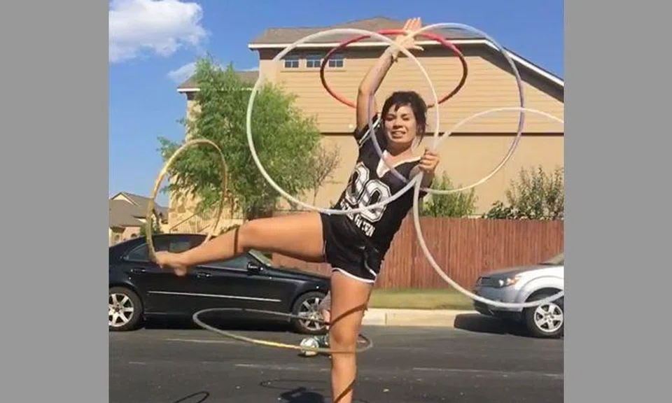 Girl spinning multiple hula hoops at the same time will leave you amazed