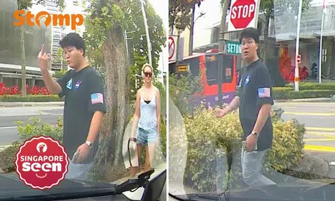 pedestrian points middle finger