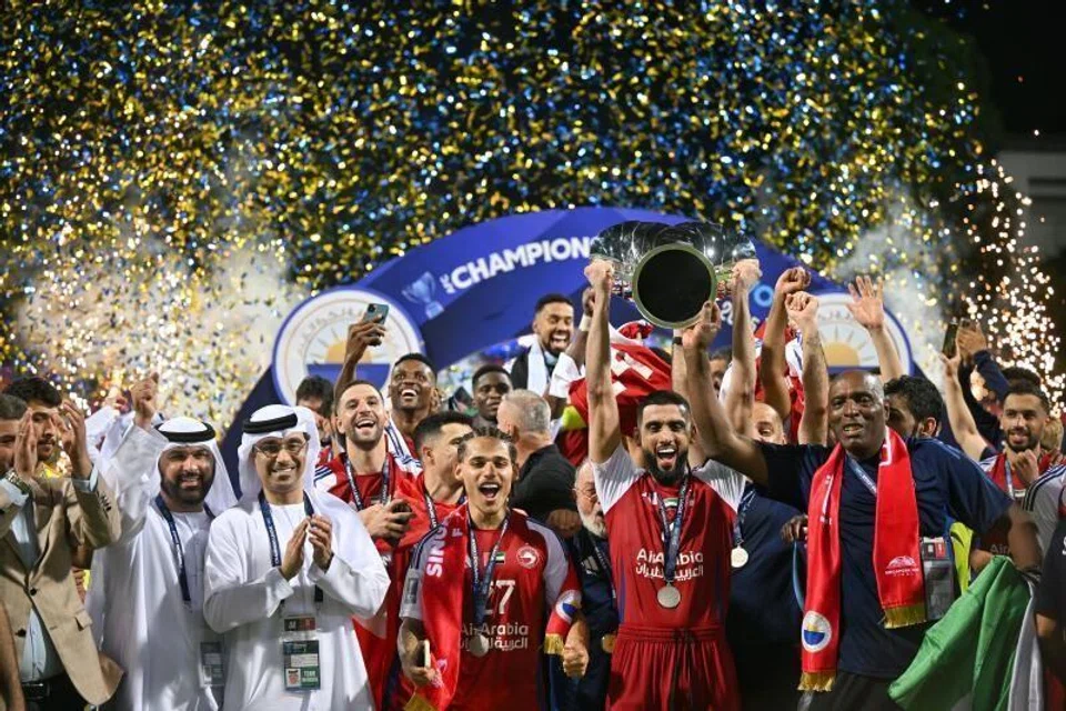 ACL2 Champions Sharjah FC, lifting the trophy after beating Lion City Sailors, at Bishan Stadium.