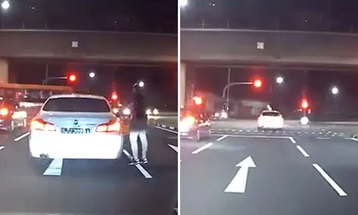 Driver doesn't move until he's approached -- then beats red light and ...