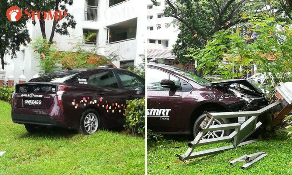 Taxi passenger taken to hospital after cab crashes into fence in accident with car at Ang Mo Kio