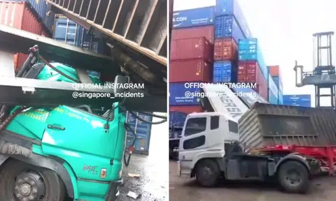 Prime mover driver nearly crushed as container stacker topples onto his cabin at Tuas worksite