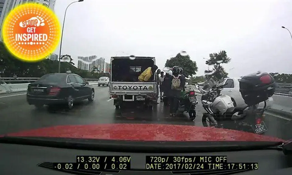 Thumbs up to motorists who stopped to help biker after he fell while ...