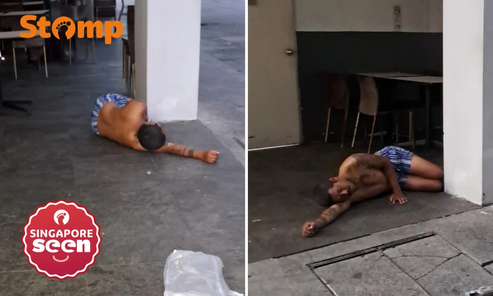 man spotted sleeping shirtless on food court floor