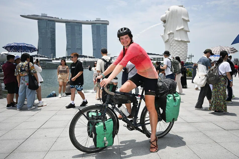 Ms Esme Hotston Moore at Merlion Park on March 31. She took about a year to cover the 25,000km distance across 28 countries from her home town in Somerset, England.