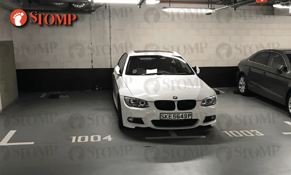 BMW driver thinks his car is too big for just 1 parking lot
