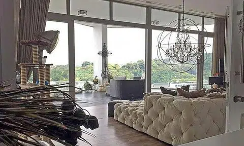 The living room in former pastor Kong Hee's penthouse has a view of the One Degree 15 Marina Club (above), and an infinity pool.PHOTOS: T. MARGARET, DESMOND FOO