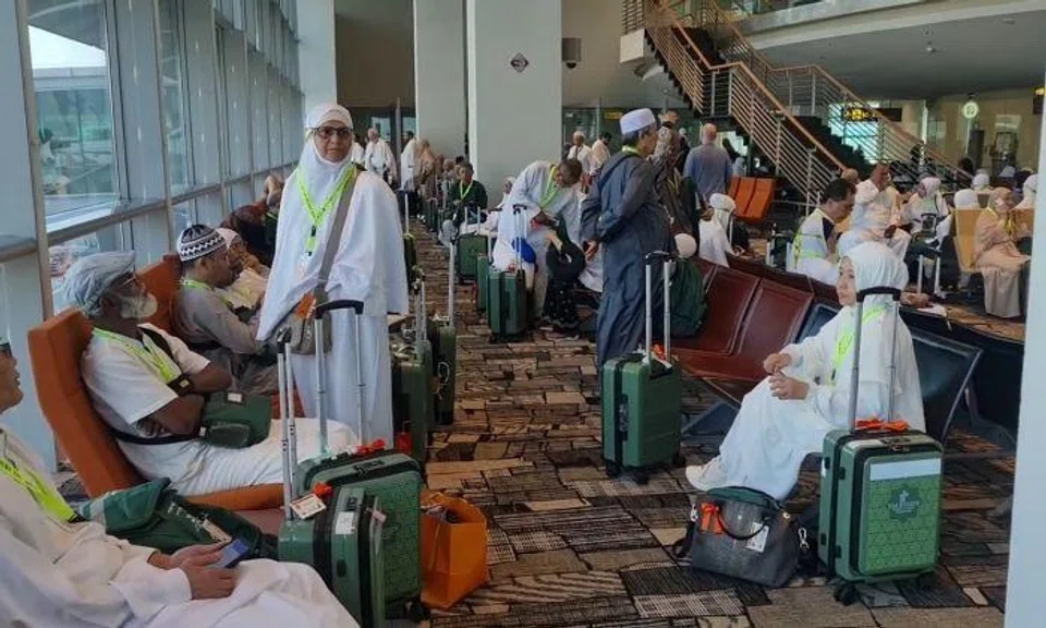 More than 100 Muslim pilgrims from Singapore were stranded in their plane at Changi Airport for over four hours on Friday morning before they were told to disembark.