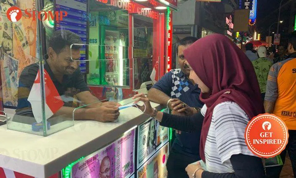 Money changer gives out free masks at Syed Alwi Road