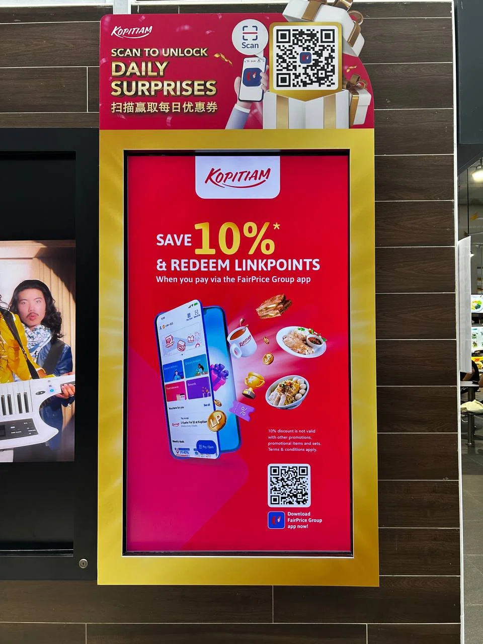 Discounts offered through FairPrice Group app on display at Anchorvale Village Hawker Centre.