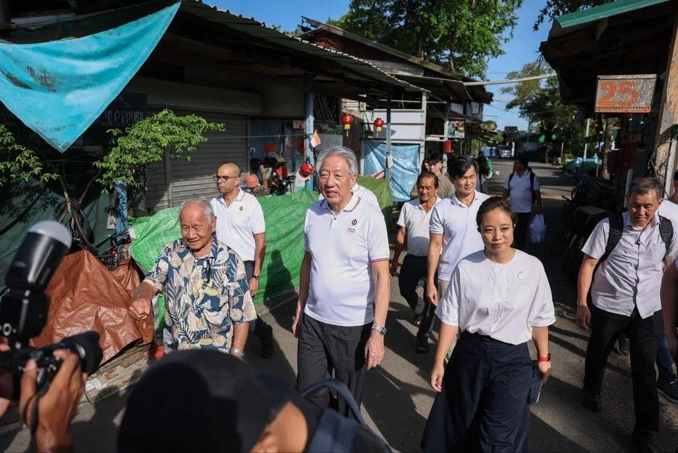 Senior Minister Teo Chee Hean (foreground, centre) leading a PAP team comprising party newcomer Valerie Lee, Senior Minister of State in the Prime Minister’s Office Desmond Tan (behind Ms Lee), Senior Minister of State (Digital Development and...